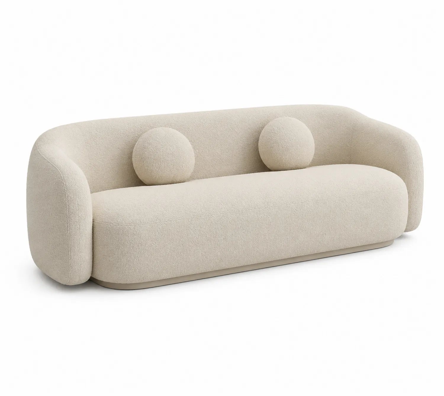 Sofá de tres plazas en tela bouclé beige con cojines redondos