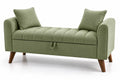 Panca contenitore con rivestimento in poliestere verde e gambe in legno
