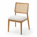 Silla de madera con respaldo de ratán y asiento de poliéster blanco