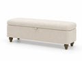Banco de tela beige con almacenamiento y patas de madera